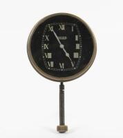 JAEGER: A rare Jaeger clock, with white Roman numeral numbering on a black face, 8cm in diameter