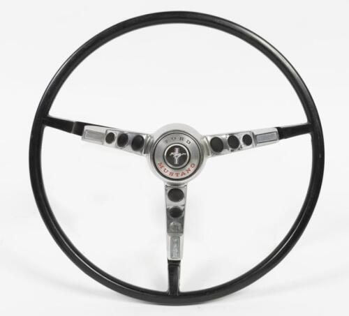 MUSTANG: A circa mid 1960s Ford Mustang three spoke steering wheel, 40cm in diameter