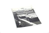 ASTON MARTIN 1998 CALENDAR: A large format factory Aston Martin calendar from 1998 (61cm x 46cm), together with an unframed 1997 factory poster covering the David Brown (56cm x 42cm), both in fair condition and a copy of the 2002 Goodwood Revival event pr - 6
