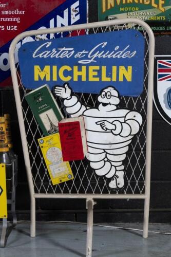 MICHELIN: A scarce 1950s/1960s French Michelin 'Maps and Guides' double sided tin sign featuring Bibendum surrounded by French maps, mounted on a stand&nbsp;approx 112cm high, 71cm wide, 29cm deep.