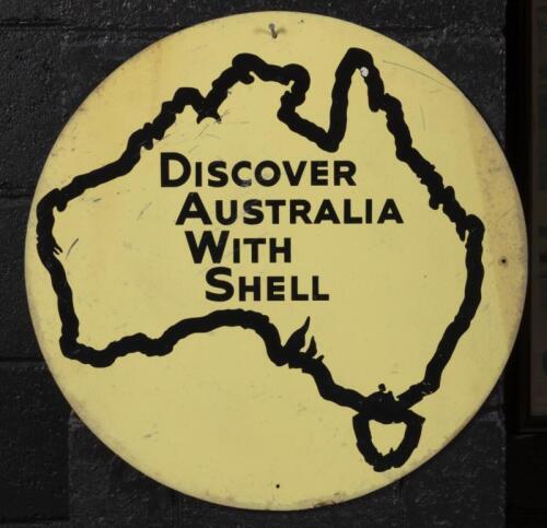 SHELL: A c1960s 'Discover Australia With Shell' round tin sign featuring map of Australia. 45cm diameter