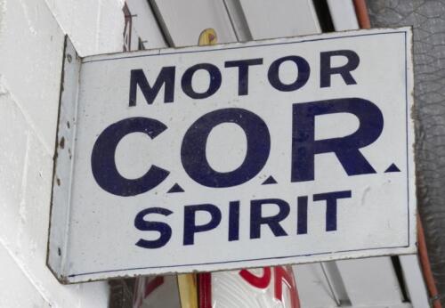 C.O.R: An original double sided enamel flange sign 'C.O.R. Motor Spirit' sign by A.Simpson & Sons Adelaide' 30.5cm high, 40cm wide.