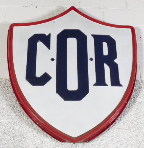 C.O.R. A large c1930s original embossed C.O.R. 'Commonwealth Oil Refineries' shield form weather vane sign, approx 115cm high, 102cm wide, 8cm deep