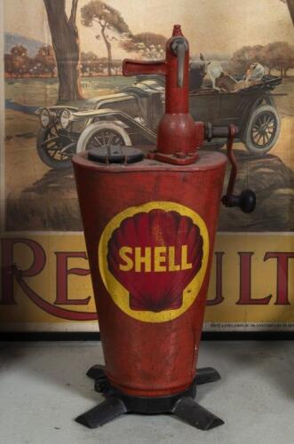 SHELL OIL: A Shell hand operated oil bottle refiller&nbsp;used&nbsp;to top up rack mounted oil bottles, has a cast iron base&nbsp;and was patented in 1925, has had a replacement lid at some stage, a very unique piece of garage equipment, approx 30cm x 70cm&nbsp;