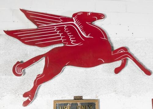 MOBIL PEGASUS: An original late 1930s Mobil Pegasus Flying Horse enamel sign, commonly referred to as a 'Cookie Cutter' style sign, right facing, , measures approx 115.5cm high, 175cm wide&nbsp;