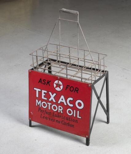 TEXACO: An original eight bottle oil rack with original enamel 'ASK FOR TEXACO MOTOR OIL' sign by Metters Ltd. stand measures 81cm high, 47cm wide, 32cm deep, sign itself measures 35.5cm high, 47cm wide