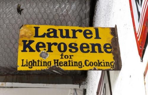 LAUREL KEROSENE: An early original double sided 'Laurel Kerosene for Lighting,Heating,Cooking' enamel flange sign by Jas. Robertson, Enl Syd. 30cm high, 53cm wide.