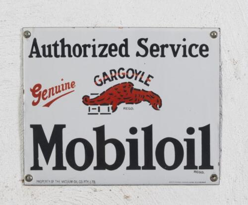 MOBIL: A&nbsp;reproduction&nbsp;"Authorised Service, Genuine Gargoyle, Mobiloil" enamel sign, stamped lower left,&nbsp;'Property of the Vacuum Oil Co Pty Ltd.' and to the lower right: Laughtons Enamellers Footscray 31cm high, 74cm wide