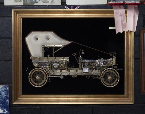 ROLLS ROYCE 1909: A excellent framed 3 dimensional&nbsp;model of a 1909 Rolls Royce Silver Ghost made from a large variety of objects including hinges, coins, architectural items and others, 71.5cm high, 91.5cm wide