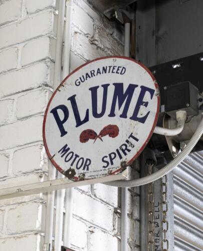 PLUME: An original double sided Plume Motor Spirit disc enamel sign by A.Simpson & Son Adelaide 35.5cm diameter&nbsp;
