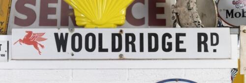 MOBIL: An excellent enamel 'Wooldridge Rd.' sign featuring the 'Flying Pegasus'&nbsp;13cm high, 89cm wide.