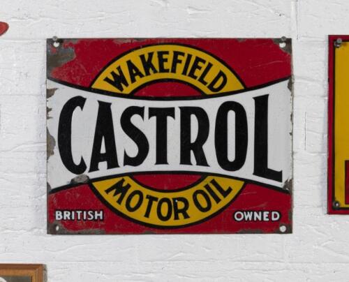 CASTROL: An original 'Castrol Wakefield Motor Oil' six oil bottle rack front enamel sign, 30.5cm high, 38cm wide
