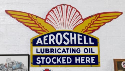 AEROSHELL: A reproduction enamel Shell&nbsp;'Aeroshell Lubricating Oil Stocked Here' sign, 50cm high, 97cm wide