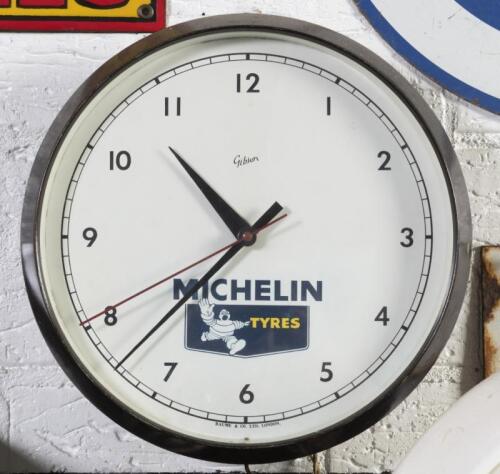 MICHELIN: A c1950s Gibson Baume & Co Ltd London clock with Michelin Tyres advertising, approx 32cm diameter, working order