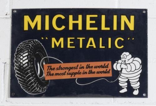 MICHELIN: An enamel Michelin "Metalic" tyres sign 'The Strongest In The World' 35cm high, 52cm wide. Production date unknown