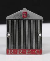 ROLLS ROYCE: An enamel Rolls Royce enthusiasts club grille badge, has had holes drilled into each side, 7cm high, 6cm wide&nbsp;