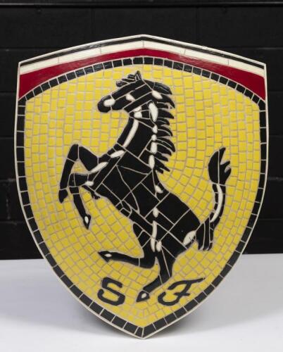 FERRARI: A convex shield form Ferrari mosaic tile sign, 58cm high, 46cm wide