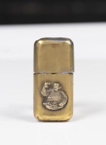 MICHELIN: A rare early Michelin lighter with embossed Bibendum&nbsp;figure to front, 6cm high