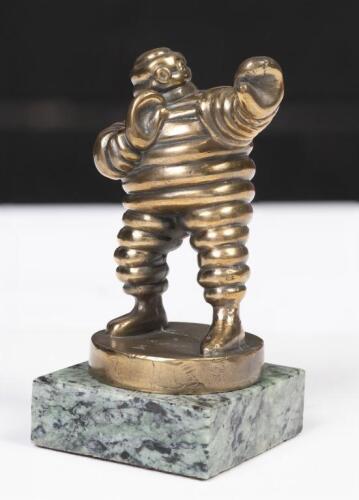 MICHELIN: A solid brass&nbsp;Michelin Bibendum&nbsp;figure in a boxing pose standing on a small marble base, overall height 13cm