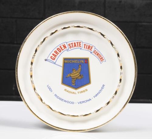 MICHELIN: A large decorative American Michelin 'Garden State Tire Centers' ash tray plate, 22cm in diameter