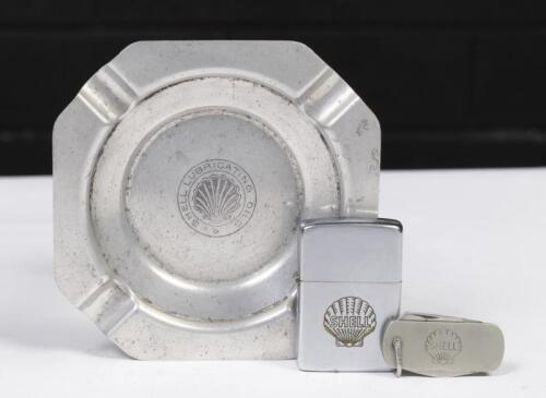 SHELL: A group of three Shell Oil promotional items, including&nbsp;an ash tray 12cm wide, a Zippo lighter and a small pocket knife marked Ardrossan Refinery