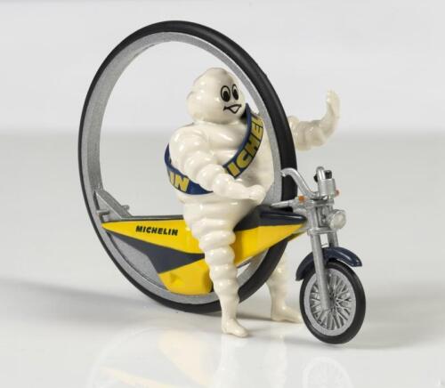 MICHELIN: A rare&nbsp;Norev 1:43 scale Bibendum&nbsp;figure riding a 1997 Tour de France motorcycle