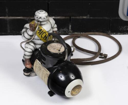MICHELIN: A c1920s/1930s French Bibendum figural&nbsp;portable compressor produced Toussaint & Cie, France, restored for David by Peter Vandersluys, 27cm high, 28cm long