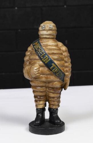MICHELIN: A reproduced cast Michelin Bibendum standing statue, sash reads 'Sydney 1938' at rear, 25cm high