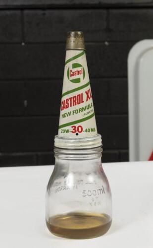 CASTROL: A original 500ml glass oil bottle with Castrol&nbsp;'XL' New Formula 20W-30-40MS grade, tin top complete with dust cap