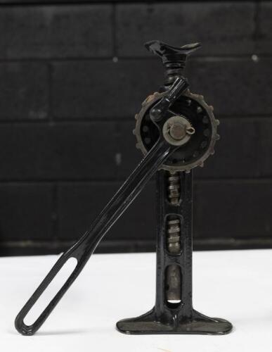 JACK: A early small metal jack with 'SJ10' cast to side, 25cm high