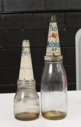 MOBILOIL: Two original glass oil bottles, a one quart with tin Mobiloil 'AF' '40' grade top and a one imperial pint with tin Mobiloil '30' 'A' grade top