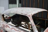 ASTON MARTIN DB2/4: A partial bodyshell, with hatchback and rear window glass plus some additional body parts [Location: Sydney] - 19