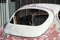 ASTON MARTIN DB2/4: A partial bodyshell, with hatchback and rear window glass plus some additional body parts [Location: Sydney] - 21