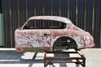 ASTON MARTIN DB2/4: A partial bodyshell, with hatchback and rear window glass plus some additional body parts [Location: Sydney] - 49