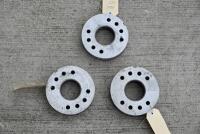 DB2/4: Three aluminium main bearing housing&nbsp;"cheeses" by Rex Woodgate in good condition [Location: Sydney]
