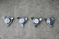 KNOCK ON SPINNERS: A set of four chrome triple ear knock-on spinners [Location: Sydney]