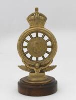 R.A.C: A Royal Automobile Club full members badge, by Elkington & Co Ltd, London, circa late 1900s, brass with enamel Union Jack, numbered 'D71', mounted on wooden base, 17cm high overall - 2