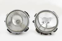 TRIUMPH: Two Triumph Stag headlights, one has a Toshiba lens and the other a Lucas lens (cracked), 14cm wide
