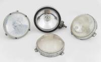 HEADLIGHTS: A group of three headlights, one chrome headlight and other two possibly Volkswagen headlights, lens width 14cm approx, untested