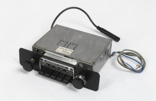CAR RADIO: An AWA Pressmatic Deluxe RU-140A AM car radio, made by Clarion, thought to suit late 1960s or early 1970s Australian cars such as Holden, Ford, Chrysler etc, 12v neg earth, complete and in working order