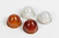 TRIUMPH: A group of four original Lucas, made in England,&nbsp;Triumph TR2/3&nbsp;tail light lenses, two amber lenses & two clear lenses
