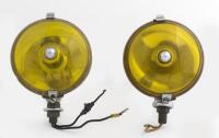 LUCAS: A pair of Lucas SLR576 yellow lens fog/driving lights with chrome backing, thought to suit Jaguar XK140/XK150, lens diameter 15cm