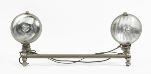 LUCAS: A pair of Lucas SFT576 fog/driving lights fixed to rack assembly