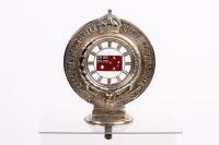 RACV: A c1917-1919 Royal Automobile Club Associate pedestal mounted badge, with enameled centered ensign and winged veteran car logo, numbered '1018' manufactured by Stokes & Sons Melbourne, 14.5cm high overall - 4