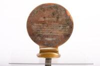 NRMA: A c1927-1929 National Roads & Motorists Association NSW pedestal mounted grille badge numbered to reverse '34061' manufactured by Angus & Coote Sydney, 13cm high overall - 3