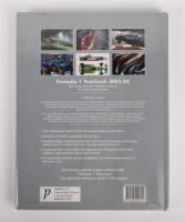 FORMULA 1: 'Formula 1 Yearbook 2003-04', hardcover book, signed by 46 drivers, test drivers, third drivers, managers & engineers, 222 pages - 3