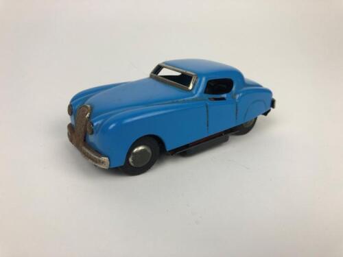 TIN TOY JAGUAR: A Japanese Jaguar Tin Toy