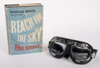 AVIATION: 'Reach for the Sky - Douglas Bader His Life Story', hardcover book by Paul Brickhill, published 1954 and lot also includes a set of aviation goggles