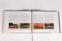 CADILLAC: 'Cadillac at 100 - Legacy of Leadership - 1902-2006, Volumes One & Two', two book hardcover set in slipcase, published 2008 - 4