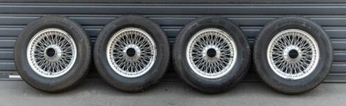 WIRE WHEELS: A set of four, 15 Inch Dunlop wire wheels with tyres, 72 spoke wheel, tyre rating 185/80R15, came off a Jaguar E-Type but thought to also suit a Jaguar Mk2, all tyres matching